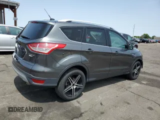 2015 Ford Escape Titanium with VIN 1FMCU9J98FUB49112, listed as a Copart auction lot 58989915 with 94,060 mi miles and Salvage title. Bid and sale history available at DreamBid. Image 3.