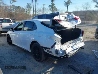 2023 Toyota Camry SE with VIN 4T1T11AKXPU167223, listed as a IAAI auction lot 41667076 with 31,658 mi miles and . Bid and sale history available at DreamBid. Image 14.