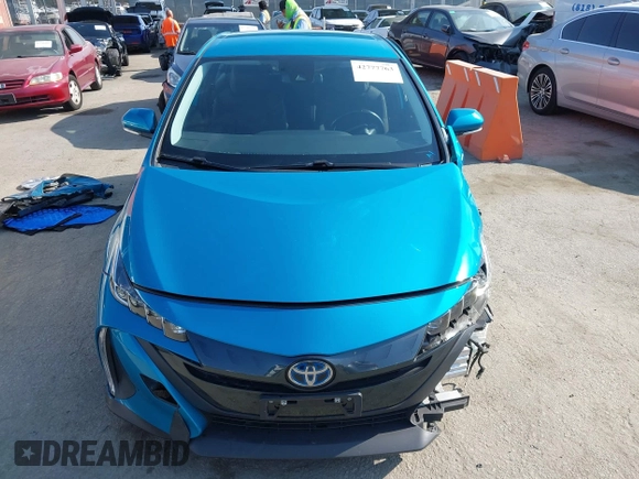 2022 Toyota Prius LE with VIN JTDKAMFP8N3209977, listed as a IAAI auction lot 42777763 with 52,995 mi miles and . Bid and sale history available at DreamBid. Image 13.