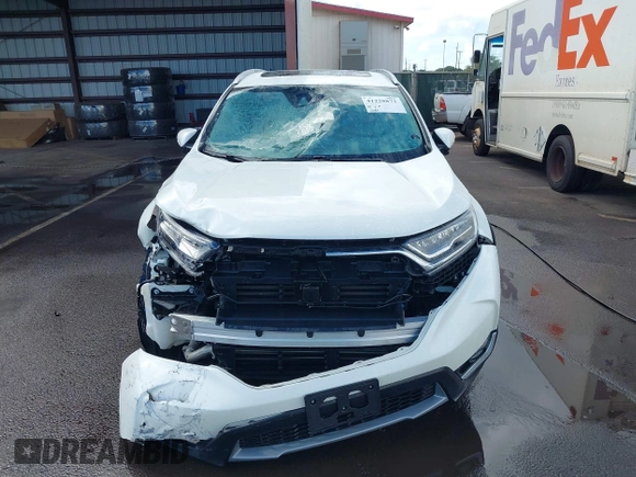 2018 Honda CR-V Touring with VIN 2HKRW1H96JH506435, listed as a IAAI auction lot 41228873 with 11,585 mi miles and . Bid and sale history available at DreamBid. Image 13.