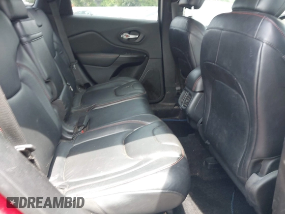 2014 Jeep Cherokee Trailhawk with VIN 1C4PJMBS7EW162357, listed as a IAAI auction lot 42601903 with 104,768 mi miles and . Bid and sale history available at DreamBid. Image 8.