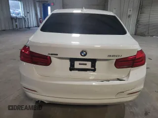 2018 BMW 3 Series 320i xDrive с VIN WBA8E5G51JNV02570, выставлен на аукционе Copart как лот 49970335 с пробегом 78 819 миль миль и Списание • Salvage title. История ставок и продаж доступна на DreamBid. Изображение 6.