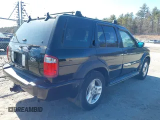 2002 Infiniti QX4 Luxury z VIN JNRDR09Y12W261007, wystawiony jako IAAI lot #41741097 z przebiegiem 114 945 mil mil oraz . Historia ofert i sprzedaży dostępna na DreamBid. Obrazek 4.