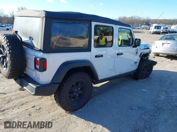 2021 Jeep Wrangler Unlimited Sport S with VIN 1C4HJXDG5MW697149, listed as a IAAI auction lot 41642386 with 71,253 mi miles. Bid and sale history available at carsss.com. Image 4.