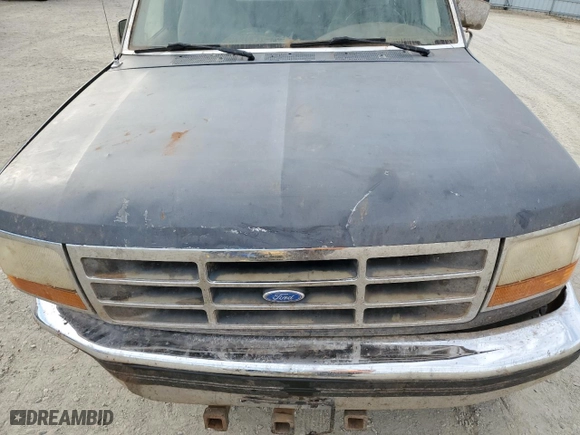 1994 Ford F-250 HD with VIN 1FTHX26G6RKB58004, listed as a Copart auction lot 77279664 with 124,556 mi miles and Salvage Title. Bid and sale history available at carsss.com. Image 11.