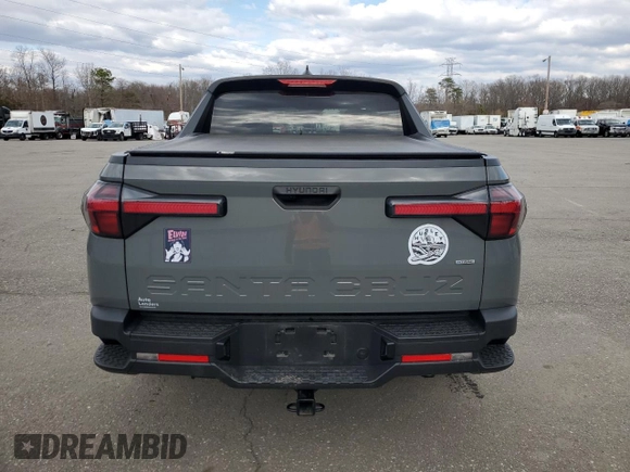 2022 Hyundai Santa Cruz SEL z VIN 5NTJBDAEXNH028481, wystawiony jako Copart lot #50438445 z przebiegiem Nie podano mil oraz Szkoda całkowita • Salvage title. Historia ofert i sprzedaży dostępna na DreamBid. Obrazek 6.