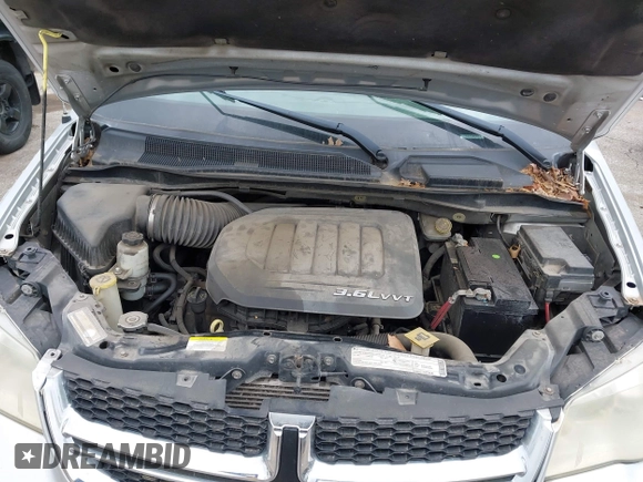 2011 Dodge Grand Caravan Crew with VIN 2D4RN5DG7BR786789, listed as a IAAI auction lot 42141124 with 167,353 mi miles and . Bid and sale history available at DreamBid. Image 10.