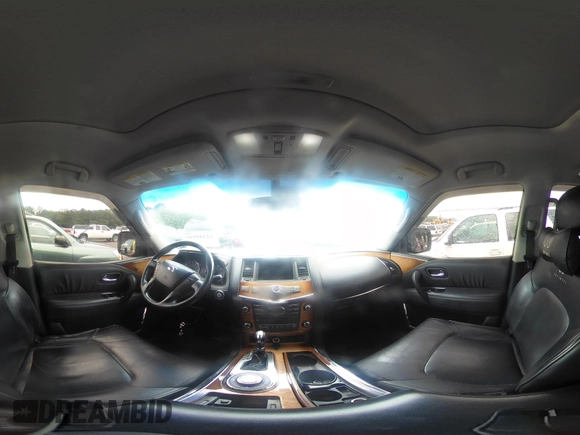 2012 Infiniti QX56 7-passenger z VIN JN8AZ2NEXC9017449, wystawiony jako IAAI lot #42349105 z przebiegiem 244 048 mil mil oraz . Historia ofert i sprzedaży dostępna na DreamBid. Obrazek 18.