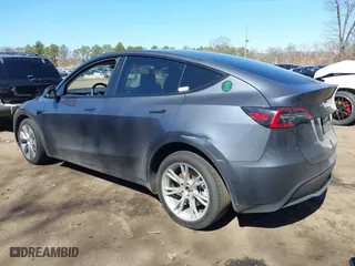 2023 Tesla Model Y Long Range with VIN 7SAYGDEEXPA175104, listed as a IAAI auction lot 41821928 with 52,791 mi miles. Bid and sale history available at carsss.com. Image 14.