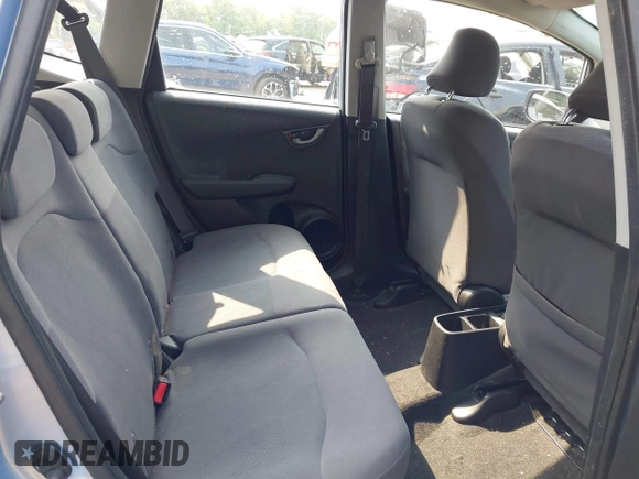 2009 Honda Fit with VIN JHMGE88209S052443, listed as a IAAI auction lot 42406572 with 140,343 mi miles and . Bid and sale history available at DreamBid. Image 8.