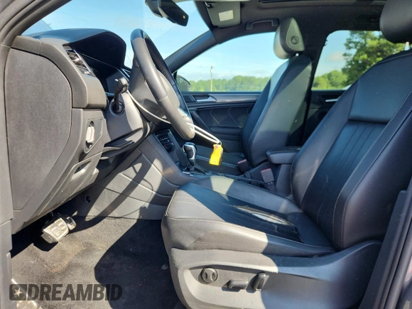 2023 Volkswagen Tiguan SE R-Line Black with VIN 3VVCB7AX3PM056471, listed as a Copart auction lot 60679225 with 94,752 mi miles and Clean title. Bid and sale history available at DreamBid. Image 7.
