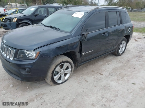 2014 Jeep Compass Latitude with VIN 1C4NJCEB7ED651270, listed as a IAAI auction lot 41561557 with 208,874 mi miles. Bid and sale history available at carsss.com. Image 17.