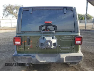 2021 Jeep Wrangler Unlimited Willys with VIN 1C4HJXDM0MW655574, listed as a Copart auction lot 82288524 with 34,986 mi miles and Salvage title. Bid and sale history available at DreamBid. Image 6.