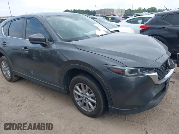 2023 Mazda CX-5 S Carbon Edition z VIN JM3KFBCM7P0226930, wystawiony jako IAAI lot #41939956 z przebiegiem 29 477 mil mil oraz . Historia ofert i sprzedaży dostępna na DreamBid. Obrazek 1.