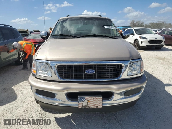 1997 Ford Expedition XLT with VIN 1FMEU17L7VLB84516, listed as a Copart auction lot 76664984 with 269,040 mi miles and Salvage title. Bid and sale history available at DreamBid. Image 5.