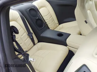 2015 Nissan GT-R Premium z VIN JN1AR5EFXFM280227, wystawiony jako IAAI lot #41920650 z przebiegiem 79 140 mil mil oraz . Historia ofert i sprzedaży dostępna na DreamBid. Obrazek 8.