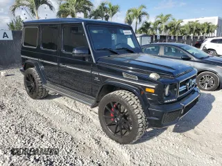 2014 Mercedes-Benz G-Class G 63 AMG with VIN WDCYC7DF1EX226915, listed as a Copart auction lot 54564045 with 54,656 mi miles and Clean Title. Bid and sale history available at carsss.com. Image 4.