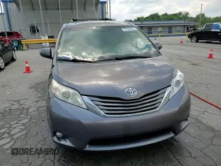 2014 Toyota Sienna XLE with VIN 5TDYK3DC6ES456558, listed as a Copart auction lot 63106085 with 231,260 mi miles and Salvage title. Bid and sale history available at DreamBid. Image 14.