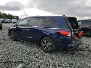 2018 Honda Odyssey Elite z VIN 5FNRL6H9XJB039802, wystawiony jako Copart lot #57116345 z przebiegiem 107 939 mil mil oraz Szkody całkowita. Historia ofert i sprzedaży dostępna na DreamBid. Obrazek 2.