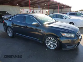 2014 Ford Taurus Limited z VIN 1FAHP2F83EG104915, wystawiony jako IAAI lot #41406872 z przebiegiem 167 658 mil mil oraz . Historia ofert i sprzedaży dostępna na DreamBid. Obrazek 1.
