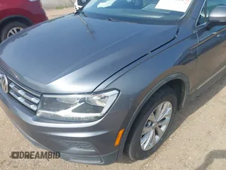 2018 Volkswagen Tiguan SEL z VIN 3VV3B7AX1JM045203, wystawiony jako IAAI lot #42572229 z przebiegiem 104 873 mil mil oraz . Historia ofert i sprzedaży dostępna na DreamBid. Obrazek 18.