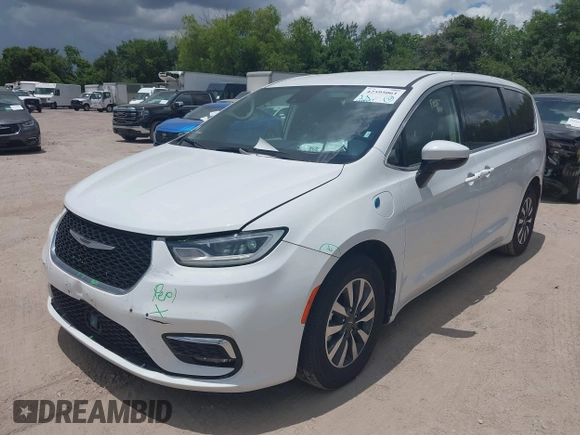 2023 Chrysler Pacifica Hybrid Touring L with VIN 2C4RC1L71PR622474, listed as a IAAI auction lot 42595061 with 55,880 mi miles and . Bid and sale history available at DreamBid. Image 17.