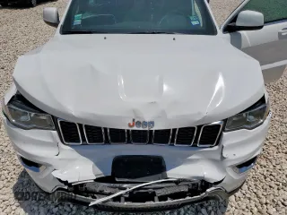 2021 Jeep Grand Cherokee Laredo E with VIN 1C4RJEAG7MC596709, listed as a Copart auction lot 57466875 with 56,164 mi miles and Salvage title. Bid and sale history available at DreamBid. Image 12.