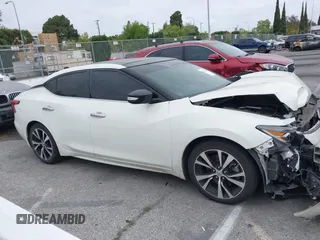 2018 Nissan Maxima SL with VIN 1N4AA6AP9JC399142, listed as a IAAI auction lot 42115954 with 77,191 mi miles and . Bid and sale history available at DreamBid. Image 13.