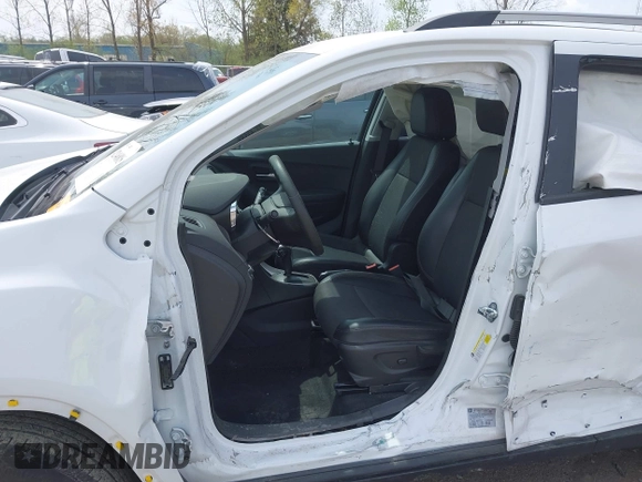 2021 Chevrolet Trax LT with VIN KL7CJPSM5MB369530, listed as a IAAI auction lot 42146885 with 21,906 mi miles and . Bid and sale history available at DreamBid. Image 6.