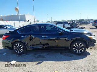 2016 Nissan Altima SV with VIN 1N4AL3AP1GC283029, listed as a IAAI auction lot 41715088 with 165,223 mi miles and . Bid and sale history available at DreamBid. Image 14.