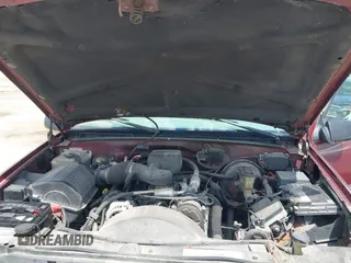 1999 Chevrolet Tahoe Z71 z VIN 1GNEK13R7XJ444925, wystawiony jako IAAI lot #42261246 z przebiegiem 183 530 mil mil oraz . Historia ofert i sprzedaży dostępna na DreamBid. Obrazek 10.