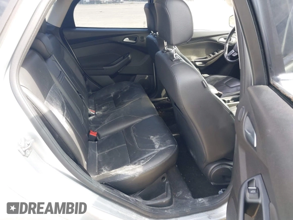 2016 Ford Focus Titanium with VIN 1FADP3J20GL238914, listed as a IAAI auction lot 42338977 with 126,276 mi miles and . Bid and sale history available at DreamBid. Image 8.