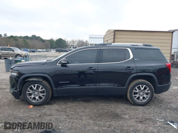 2021 GMC Acadia SLT with VIN 1GKKNMLS0MZ209789, listed as a IAAI auction lot 41521978 with 104,690 mi miles. Bid and sale history available at carsss.com. Image 14.