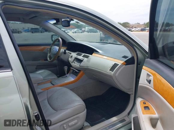2007 Toyota Avalon XL with VIN 4T1BK36B27U219456, listed as a IAAI auction lot 41747807 with 169,599 mi miles. Bid and sale history available at carsss.com. Image 5.