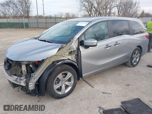 2018 Honda Odyssey EX-L z VIN 5FNRL6H72JB045639, wystawiony jako IAAI lot #41821993 z przebiegiem 60 737 mil mil oraz . Historia ofert i sprzedaży dostępna na DreamBid. Obrazek 2.