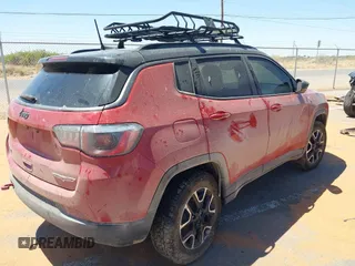 2020 Jeep Compass Trailhawk with VIN 3C4NJDDB8LT195701, listed as a IAAI auction lot 39306924 with 100,006 mi miles and . Bid and sale history available at DreamBid. Image 4.