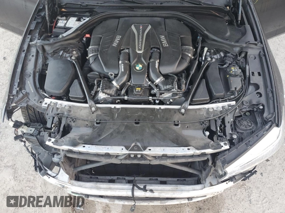 2019 BMW 5 Series M550i xDrive with VIN WBAJB9C57KB288906, listed as a Copart auction lot 79846274 with 61,744 mi miles and Salvage title. Bid and sale history available at DreamBid. Image 12.