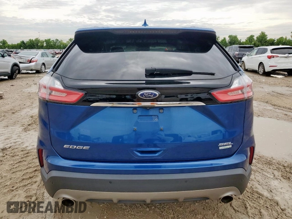 2020 Ford Edge SEL z VIN 2FMPK3J91LBA30033, wystawiony jako Copart lot #60466635 z przebiegiem 68 956 mil mil oraz Szkoda całkowita • Salvage title. Historia ofert i sprzedaży dostępna na DreamBid. Obrazek 6.