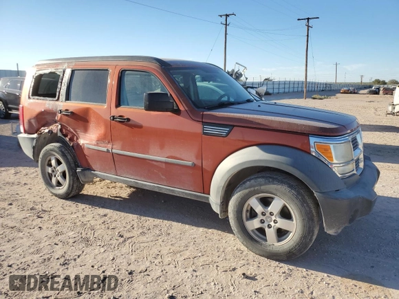 2007 Dodge Nitro SXT with VIN 1D8GU28K87W728744, listed as a Copart auction lot 77082954 with 245,632 mi miles and Salvage title. Bid and sale history available at DreamBid. Image 4.