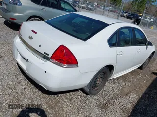 2010 Chevrolet Impala Police Police with VIN 2G1WD5EMXA1228853, listed as a IAAI auction lot 41662690 with 255,458 mi miles. Bid and sale history available at carsss.com. Image 4.