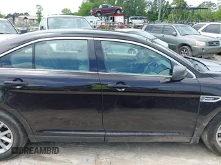 2014 Ford Taurus SE z VIN 1FAHP2D81EG140072, wystawiony jako IAAI lot #42124900 z przebiegiem 116 560 mil mil oraz . Historia ofert i sprzedaży dostępna na DreamBid. Obrazek 13.