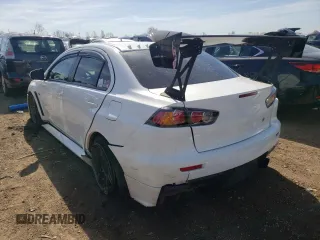 2015 Mitsubishi Lancer Evolution GSR z VIN JA32W8FV3FU022955, wystawiony jako Copart lot #50692924 z przebiegiem 88 882 mil mil oraz . Historia ofert i sprzedaży dostępna na DreamBid. Obrazek 2.