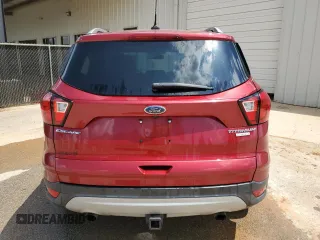 2019 Ford Escape Titanium z VIN 1FMCU0J97KUB20612, wystawiony jako Copart lot #64638415 z przebiegiem 100 102 mil mil oraz Czysty tytuł • Clean title. Historia ofert i sprzedaży dostępna na DreamBid. Obrazek 6.