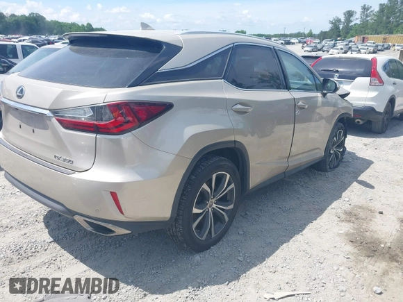 2017 Lexus RX 350 z VIN 2T2BZMCA5HC099468, wystawiony jako IAAI lot #42236279 z przebiegiem 150 005 mil mil oraz . Historia ofert i sprzedaży dostępna na DreamBid. Obrazek 4.