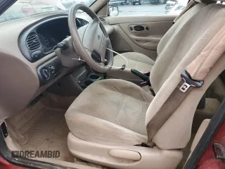 2000 Ford Contour SE Fleet z VIN 1FAFP6636YK142708, wystawiony jako Copart lot #77976124 z przebiegiem 126 879 mil mil oraz Szkody całkowita. Historia ofert i sprzedaży dostępna na DreamBid. Obrazek 7.