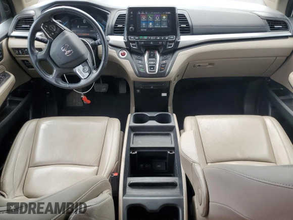 2020 Honda Odyssey Touring with VIN 5FNRL6H8XLB019365, listed as a Copart auction lot 52404335 with 59,486 mi miles and Salvage Title. Bid and sale history available at DreamBid. Image 8.