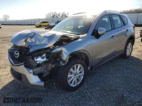 2014 Mazda CX-5 Sport with VIN JM3KE2BE1E0350718, listed as a Copart auction lot 46370205 with 98,065 mi miles and Salvage title. Bid and sale history available at DreamBid. Image 1.