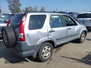 2005 Honda CR-V LX with VIN JHLRD68595C004992, listed as a IAAI auction lot 42074824 with 155,895 mi miles and . Bid and sale history available at DreamBid. Image 4.