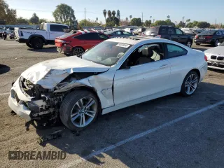 2016 BMW 4 Series 428i xDrive with VIN WBA3N9C57GK248610, listed as a Copart auction lot 84958044 with 62,485 mi miles and Salvage Title. Bid and sale history available at carsss.com. Image 1.