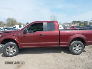2015 Ford F-150 XLT with VIN 1FTFX1EF9FFA86164, listed as a IAAI auction lot 42112185 with 115,871 mi miles and . Bid and sale history available at DreamBid. Image 14.
